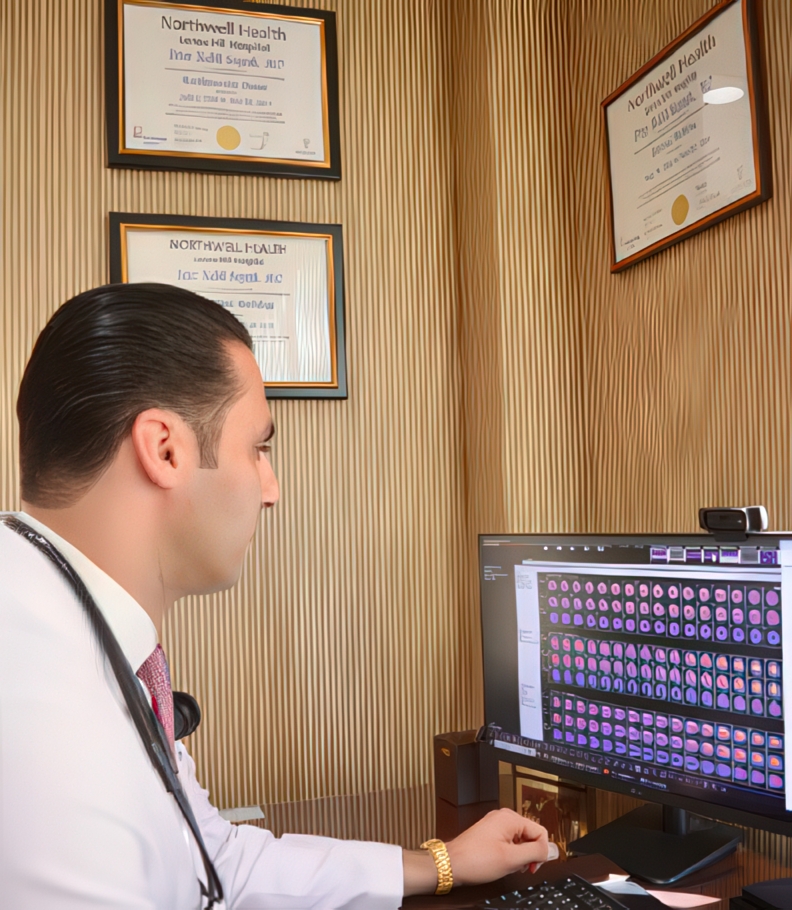 Cardiologist in New Square, NY Reading Patients Cardiac Stress Test Results