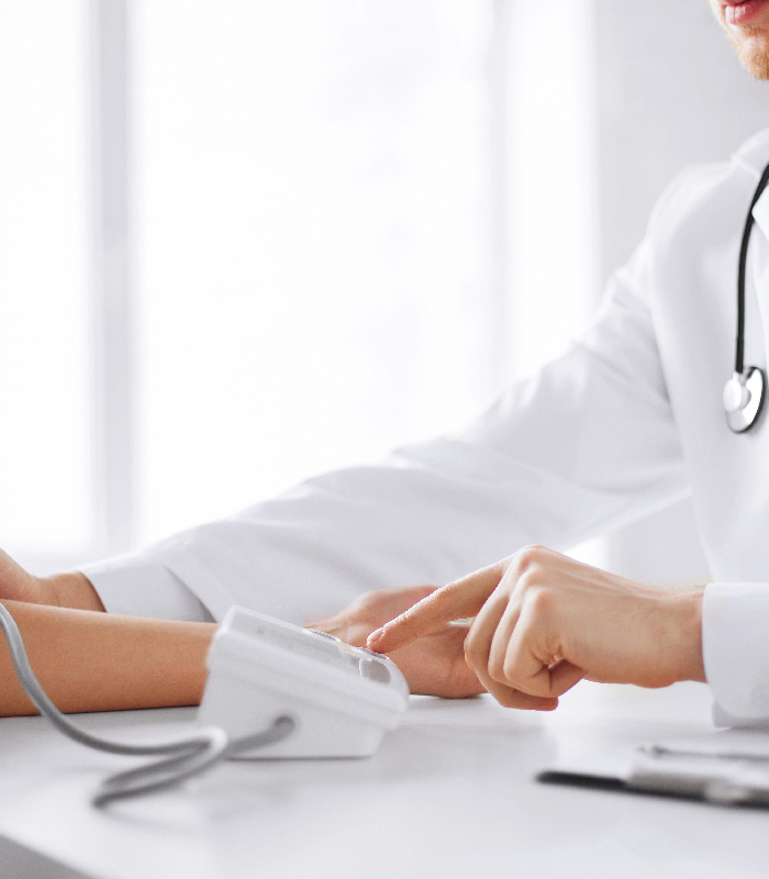 Cardiologist and Heart Dr in Chestnut Ridge, NY Checking Patient Blood Pressure
