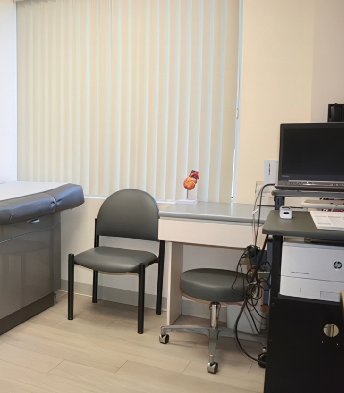 Cardiologist in New Square, NY Prepares Cardiac Stress Test in their Examination Room